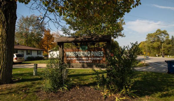 Whispering Pines Aspire Communities Entrance Sign