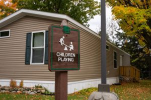 Harbor Springs Estates Aspire Communities Children Playing Sign