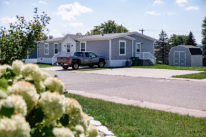 A truck is parked in front of a house in Lakeview Village.